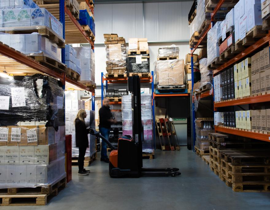 staff fufilling orders in the warehouse