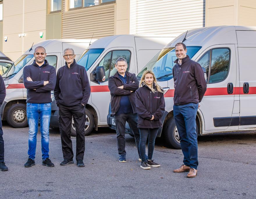 FCP standing proud by the fleet of vans 