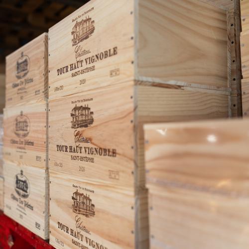 Wooden wine boxes on a shelf 