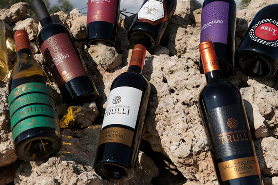 Bottels of wine on top of a rock