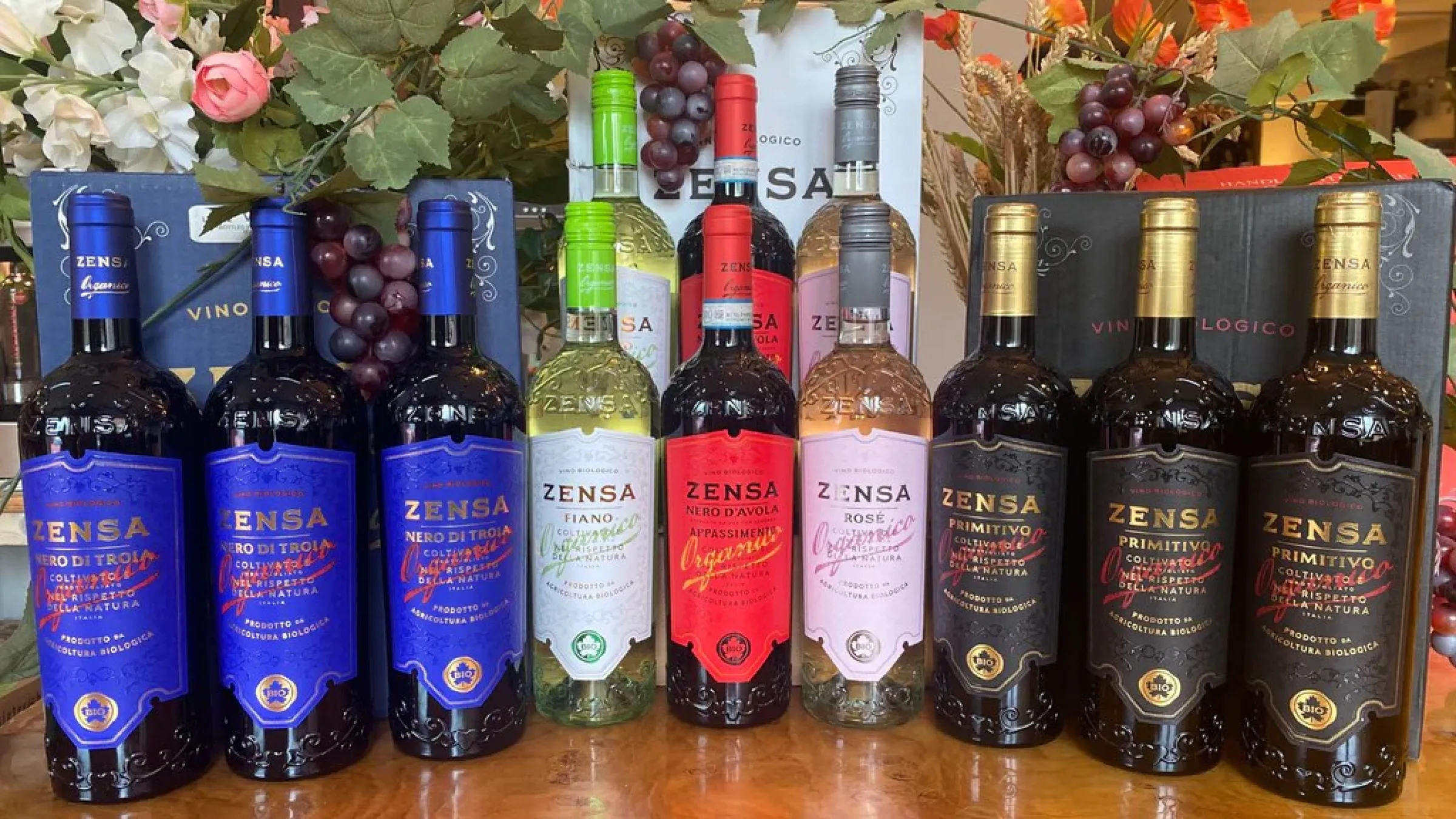 Variety of bottles of wine Zensa on top of a table