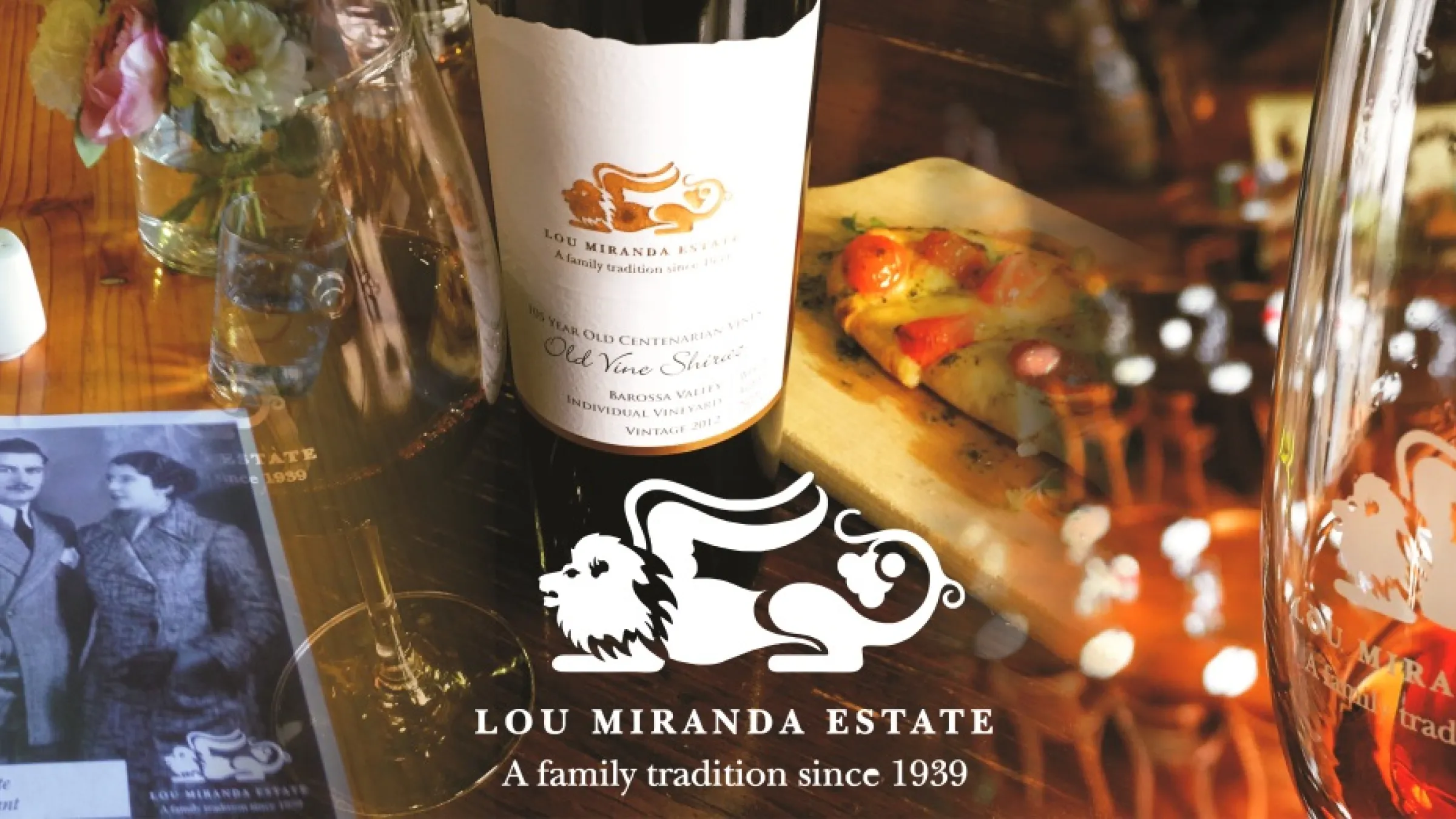 Collage of an old photo in black and white, a bottle of wine and glasses of wine and food