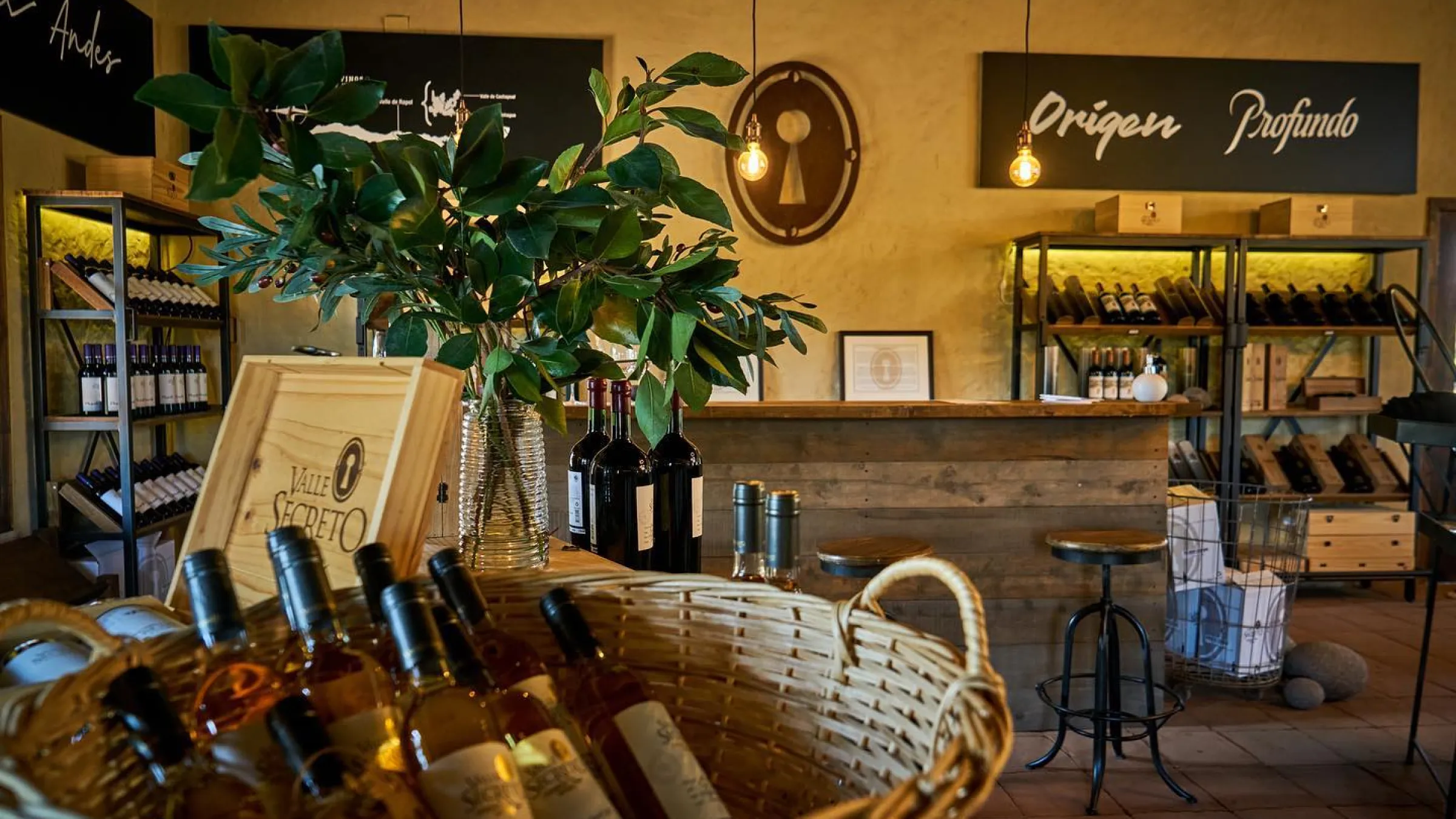 View of the Valle Secreto store with bottles on display and a bar